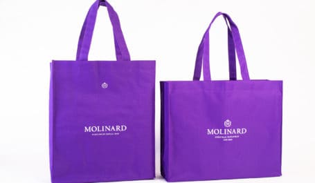 Tailor-made lined promotional shopper in 2 versions specially coloured in the brand's Pantone® colour.