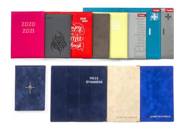 Custom-made book covers made of PVC with cardboard core or velvet with gold embossing