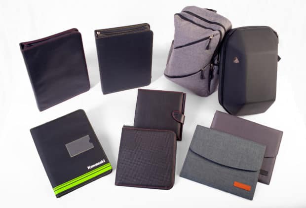 Exclusive custom-made motorcycle logbooks and Welcome Packs